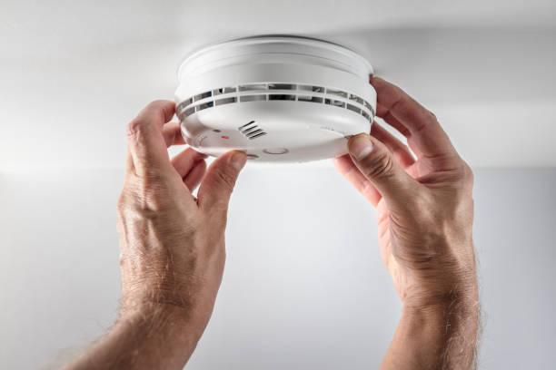 Smoke alarm installation and compliance check in a Townsville home