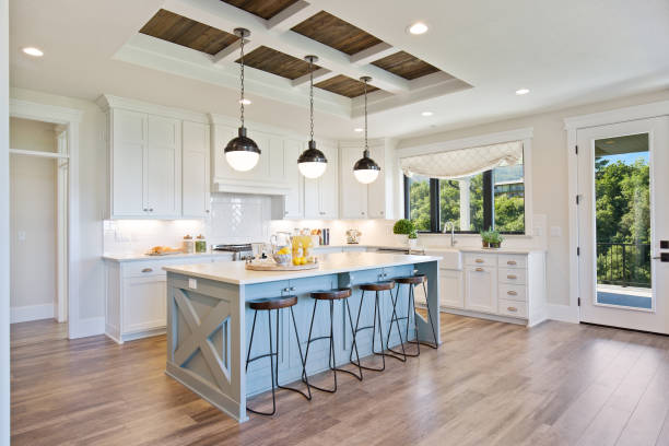 Modern kitchen with pendant lighting installed above island bench