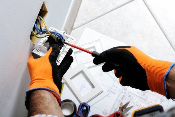 Electrician installing wiring for a new home build in Townsville